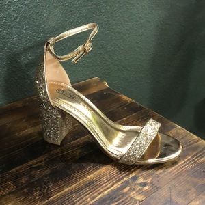 Gold 3-inch heels. Never worn.